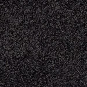 A close up of a black carpet texture.