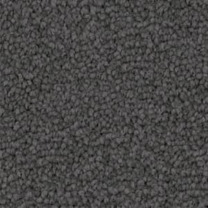 A close up of a gray carpet texture.