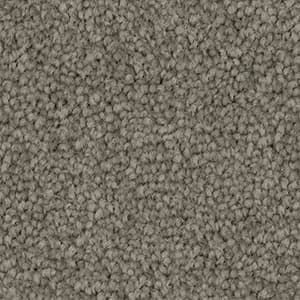 A close up of a grey carpet texture.