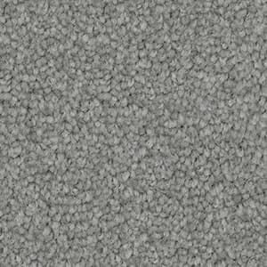A close up of a gray carpet texture.