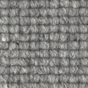 A close up of a gray carpet texture.