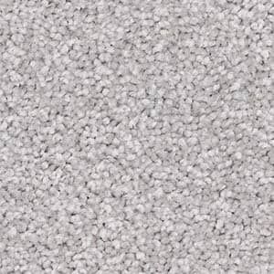 A close up of a pile of white carpet.