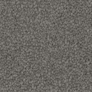 A close up of a gray carpet texture.