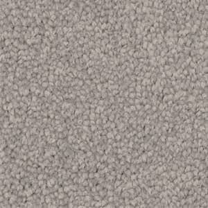 A close up of a gray carpet texture.