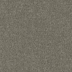 A close up of a gray carpet texture.