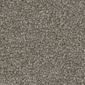A close up of a gray carpet texture.