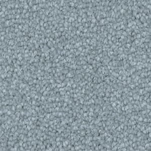 A close up of a light blue carpet texture.