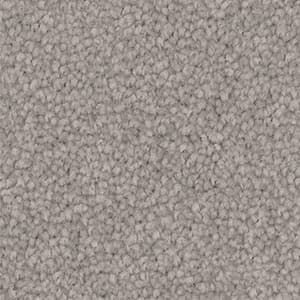 A close up of a gray carpet texture.