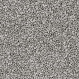 A close up of a gray carpet texture.