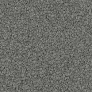 A close up of a gray carpet texture.