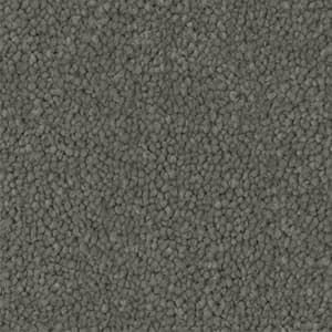 A close up of a gray carpet texture.