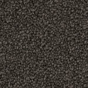 A close up of a carpet with a lot of small dots on it.