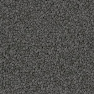 A close up of a gray carpet texture.