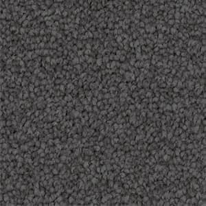 A close up of a gray carpet triexta texture.