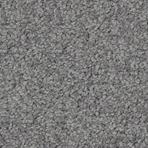 A close up of a gray carpet texture.