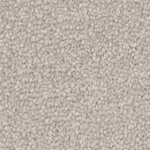 A close up of a white carpet texture.