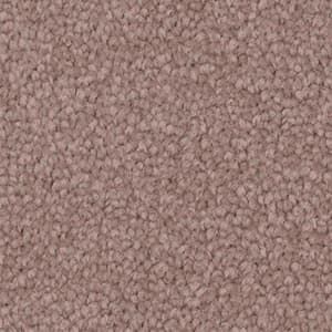 A close up of a pink carpet texture.