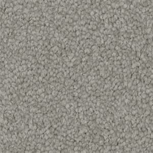 A close up of a gray carpet texture.