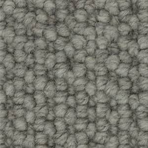 A close up of a gray carpet texture.