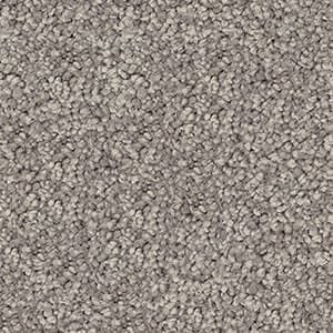 A close up of a grey carpet texture.