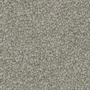 A close up of a gray carpet texture.