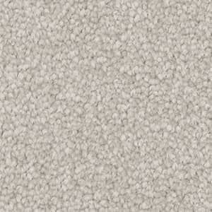 A close up of a white carpet texture.