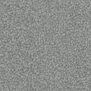 A close up of a gray carpet texture.