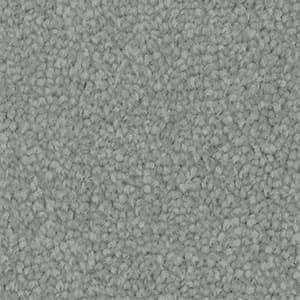 A close up of a gray carpet texture.
