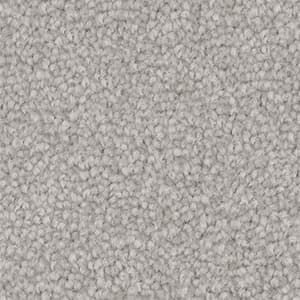 A close up of a gray carpet texture.