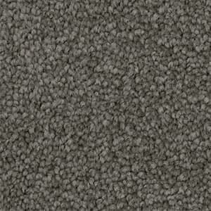 A close up of a gray carpet texture.
