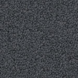 A close up of a gray carpet texture.