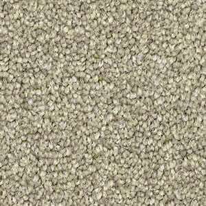 A close up of a carpet with a lot of small dots on it.