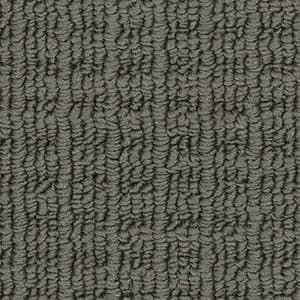 A close up of a gray carpet texture.