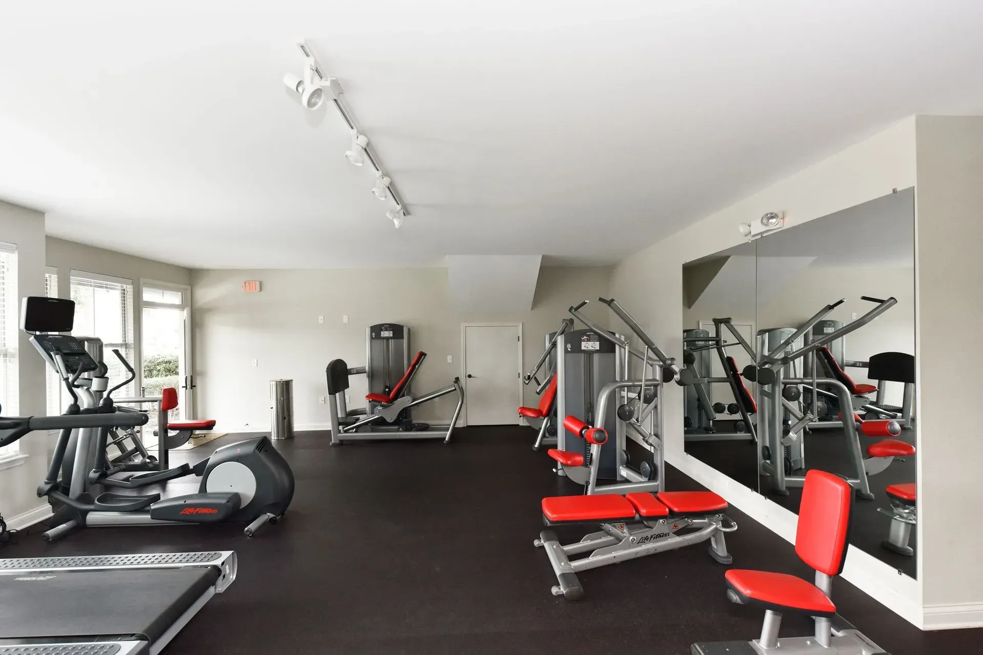 Fitness center with cardio machines and weight-lifting equipment