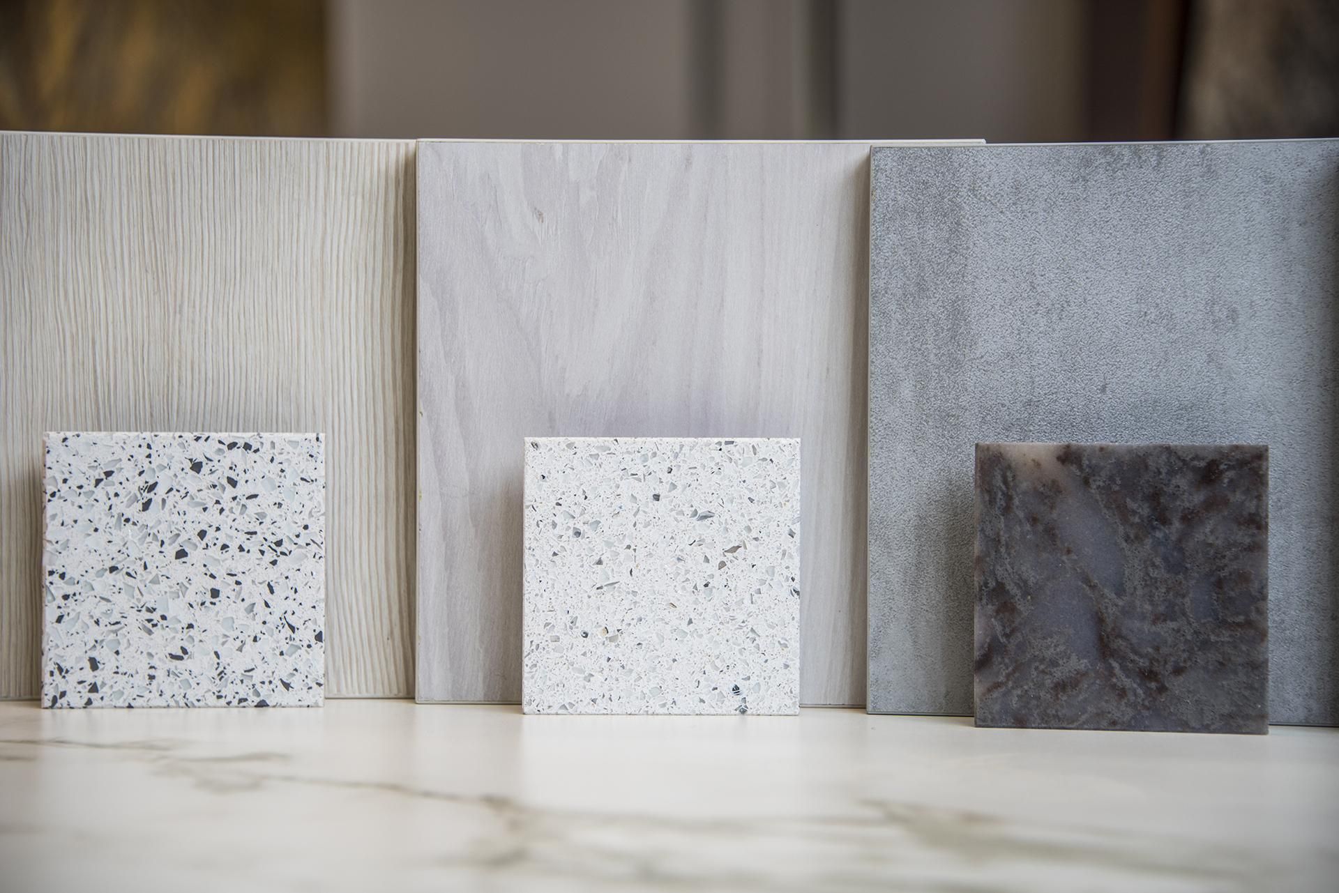 there are many different types of tiles on the table .