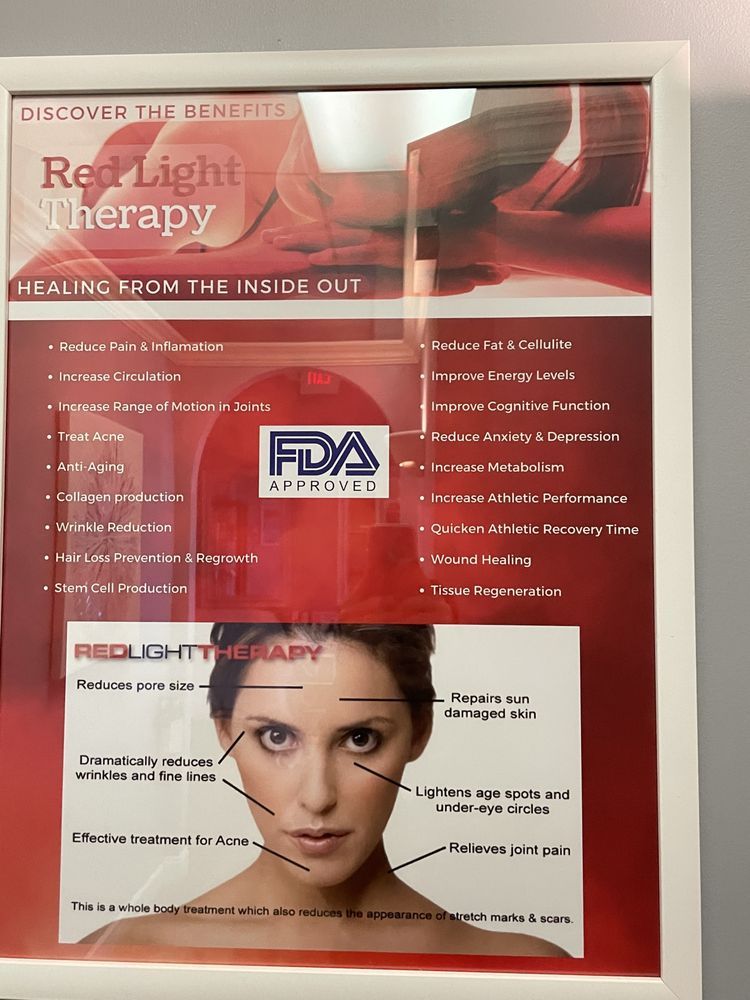 Red Light Therapy promotional poster with red header, FDA logo, and a woman's face at the bottom