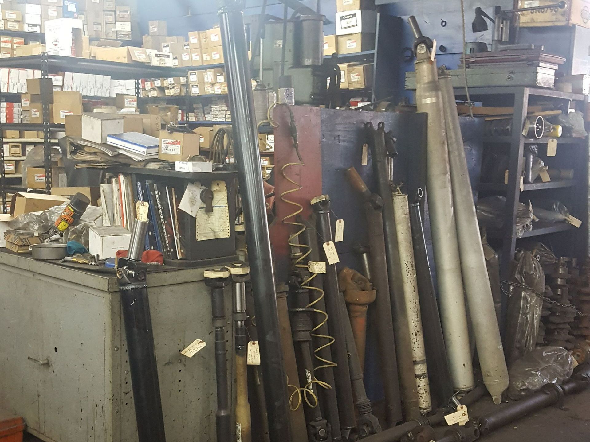 A warehouse filled with lots of pieces of metal