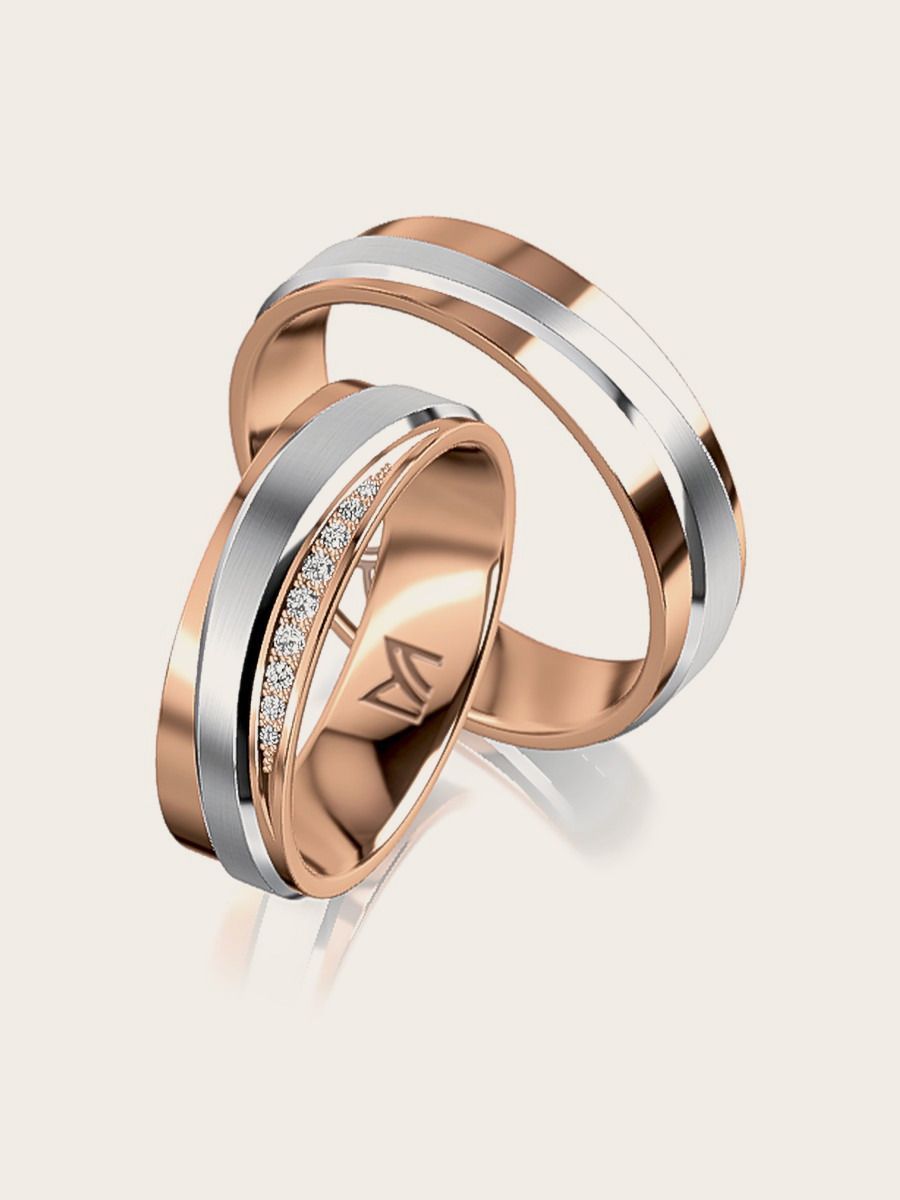 Bicolor trouwringen van Meister in rosé- en witgoud met diamanten