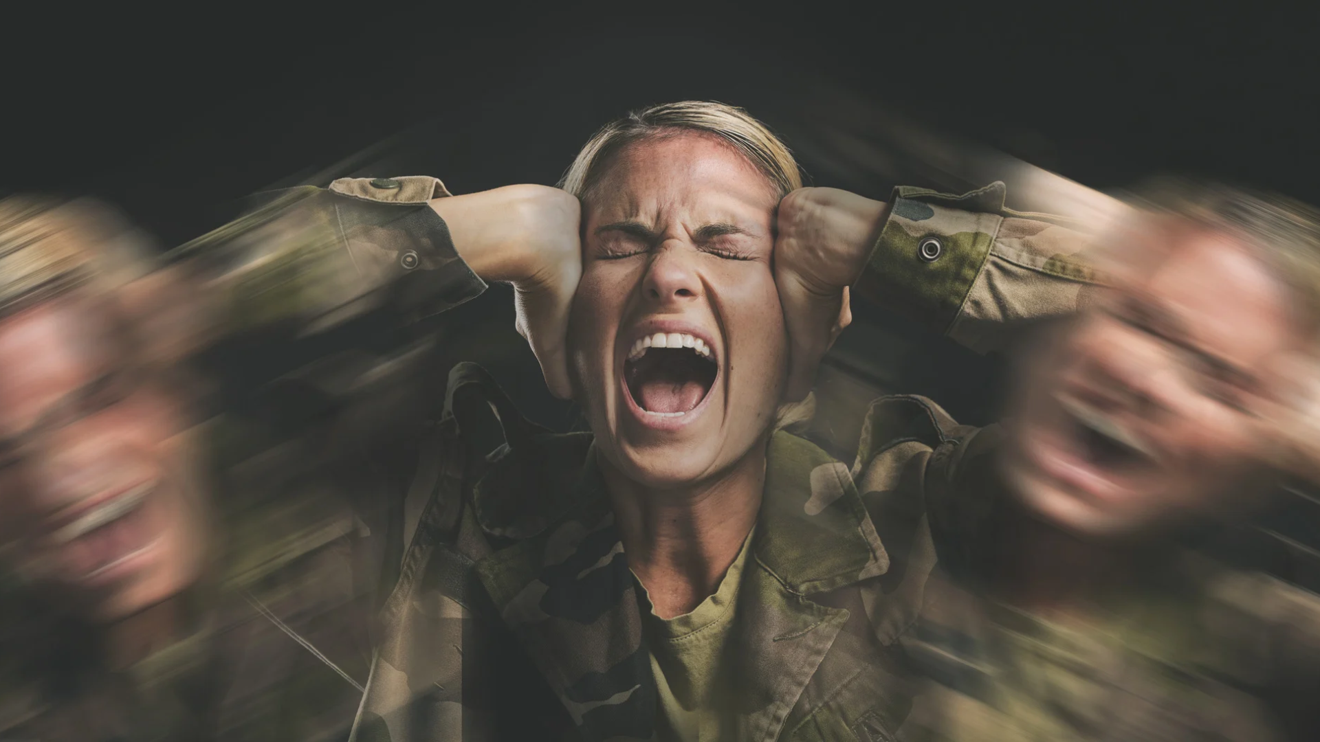 Woman in camouflage screaming with hands on head, flanked by blurred figures in motion