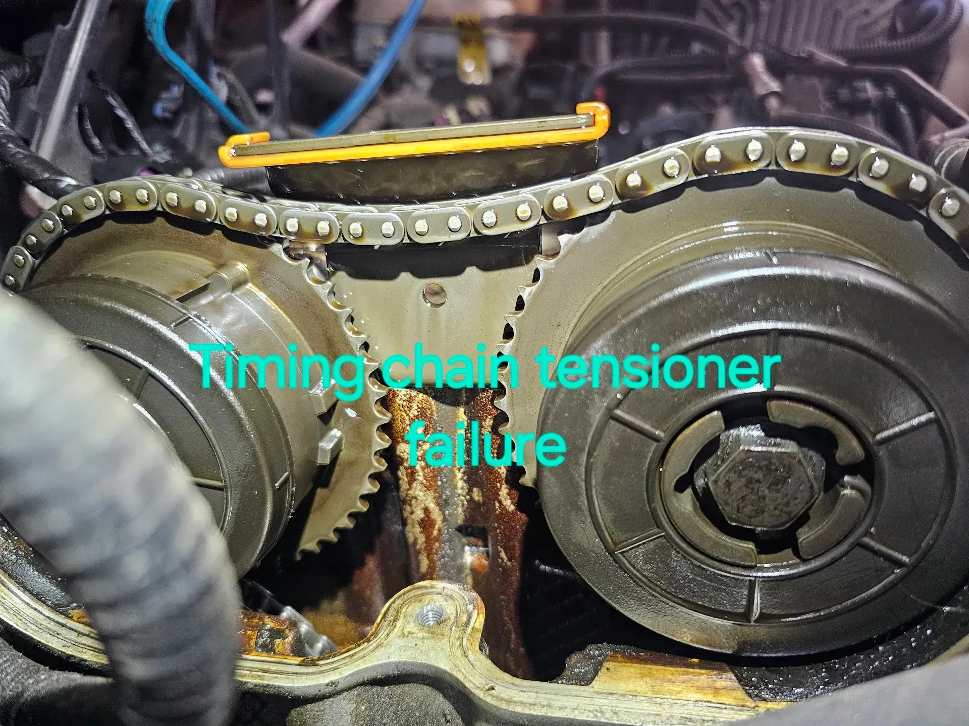 Engine Timing Chain with Highlighted Tensioner Failure | McCartha's Auto Service, LLC