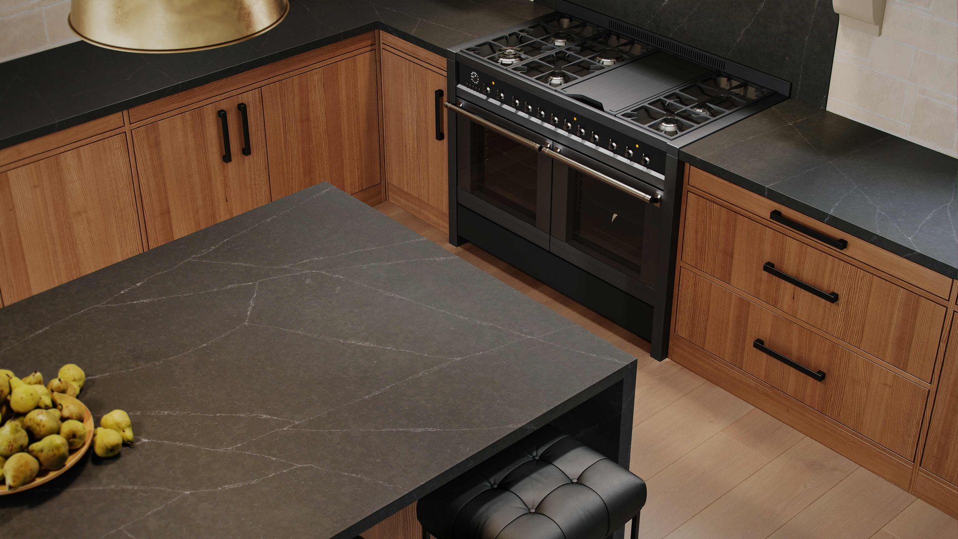 Modern kitchen with wooden cabinets, black countertops, and island.