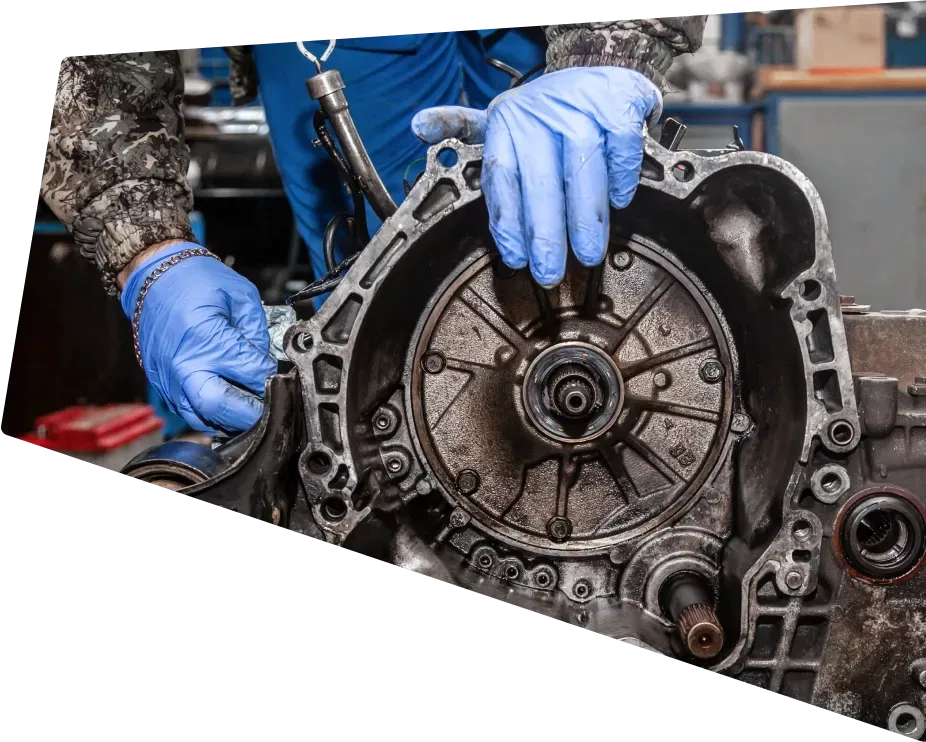 Technician performing repairs on engine for vehicle | Young's Auto & Services