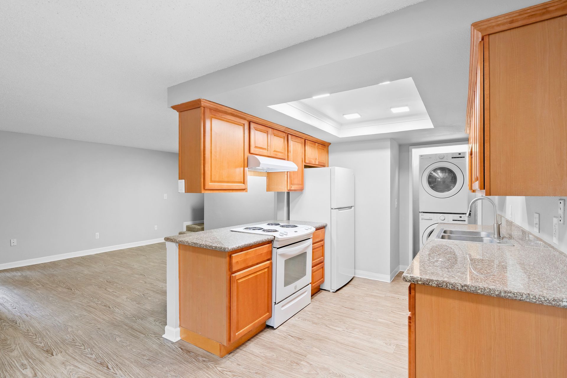 Beautiful open kitchen with in home Washer & Dryer