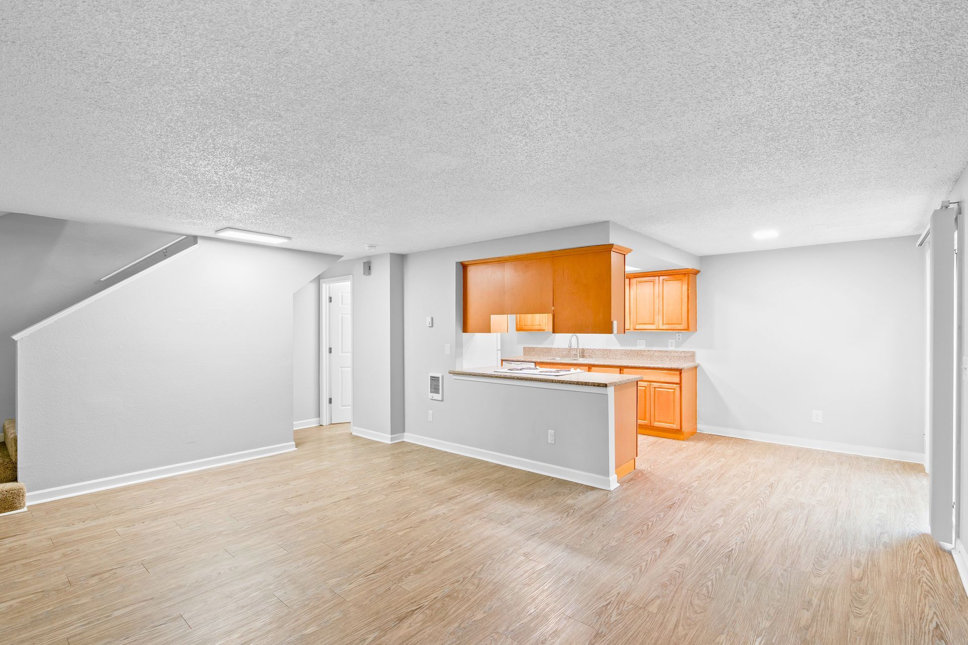 Large Townhome living room and breakfast bar in the kitchen