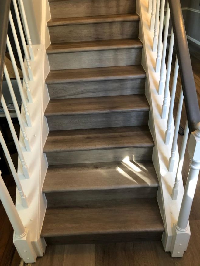 custom luxury vinyl stair treads and rises made and installed by hawkins