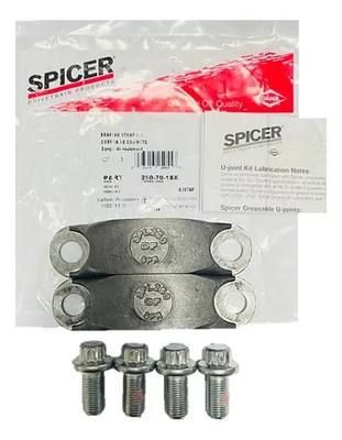Kit de cruceta Spicer. Dos correas metálicas, cuatro pernos, bolsa de piezas y manual de instrucciones.