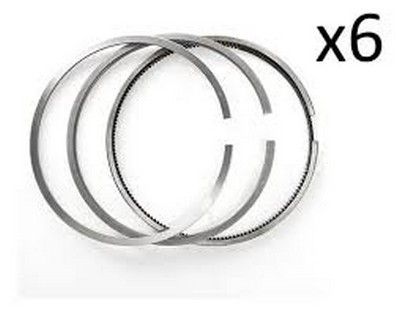 Seis anillos de pistón metálicos.