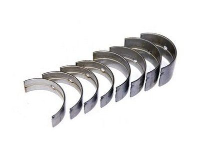 Juego de cojinetes de motor en forma de media luna fabricados en metal plateado.