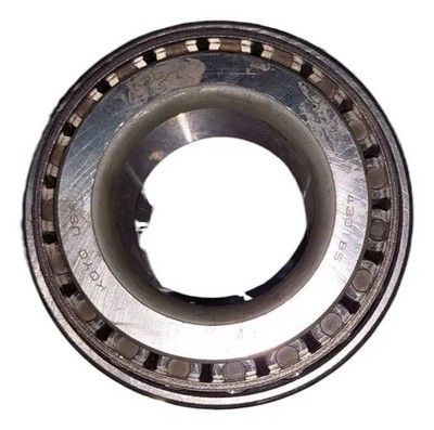 Rodamiento con la marca “KOYO USA”, tiene anillos interiores y exteriores y elementos rodantes.