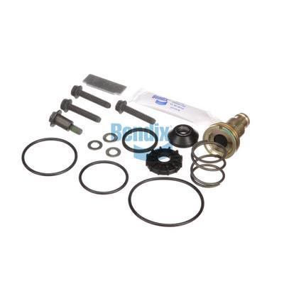 Un kit de diversos componentes de frenos de aire para vehículos, que incluye juntas, pernos y lubricante.